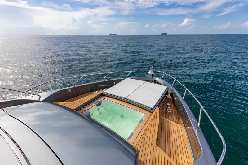 Slide: The Image of Luxurious 2020 Riva 110' Dolcevita yacht with jacuzzi, cruising on open sea. - 43