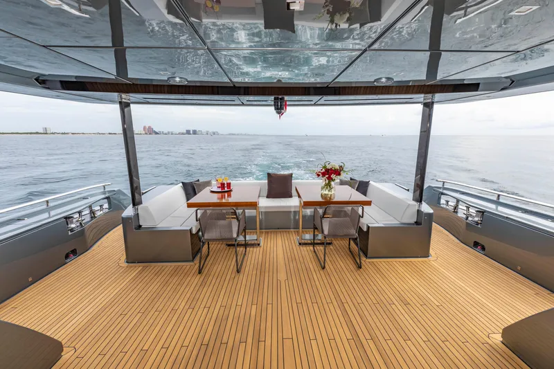 Slide: The Image of Luxurious 2020 Riva 110' Dolcevita yacht deck with elegant seating and ocean view. - 46