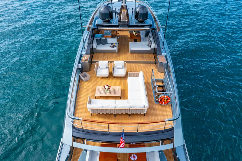 Slide: The Image of Luxurious 2020 Riva 110' Dolcevita yacht with elegant deck seating on open water. - 53