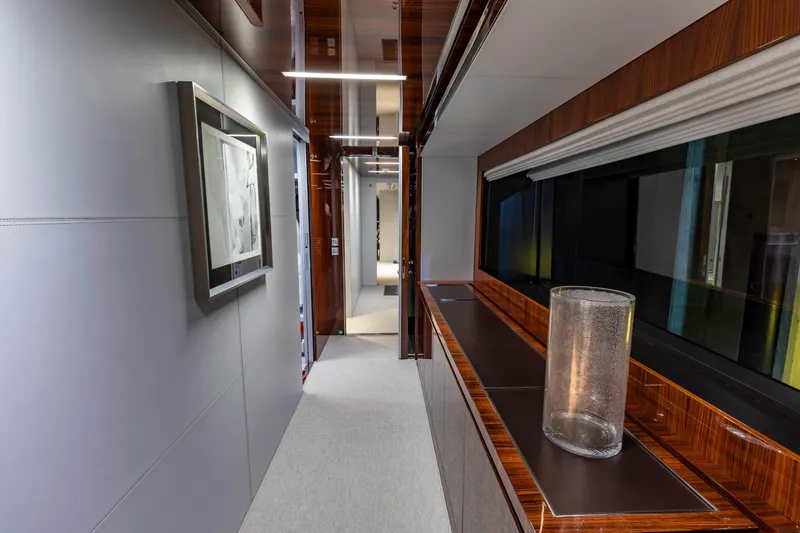 Slide: The Image of Luxurious interior hallway of 2020 Riva 110' Dolcevita yacht with modern decor. - 7