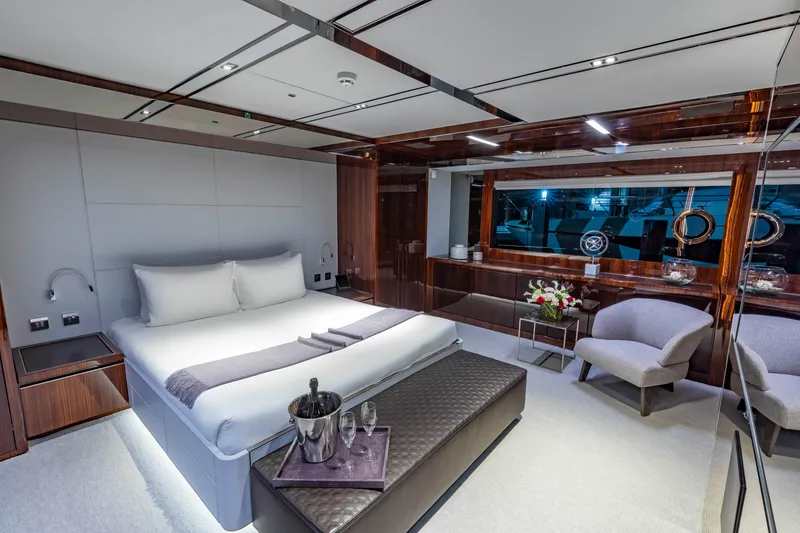 Slide: The Image of Luxurious bedroom interior on 2020 Riva 110' Dolcevita yacht with elegant furnishings. - 8