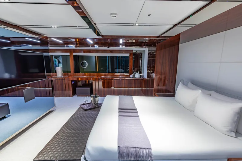 Slide: The Image of Luxurious bedroom interior of 2020 Riva 110' Dolcevita yacht with modern design elements. - 9