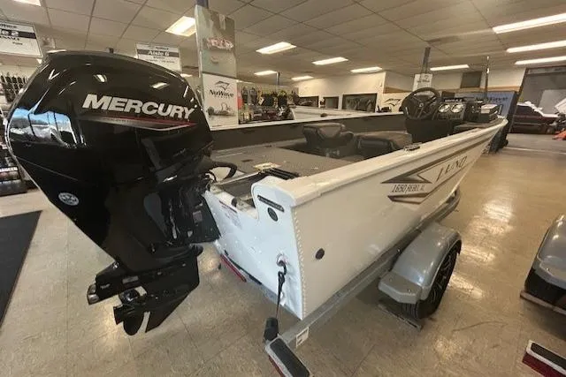 Slide: The Image of 2026 Lund 1650 Rebel XL SS boat with Mercury engine in showroom. - 3