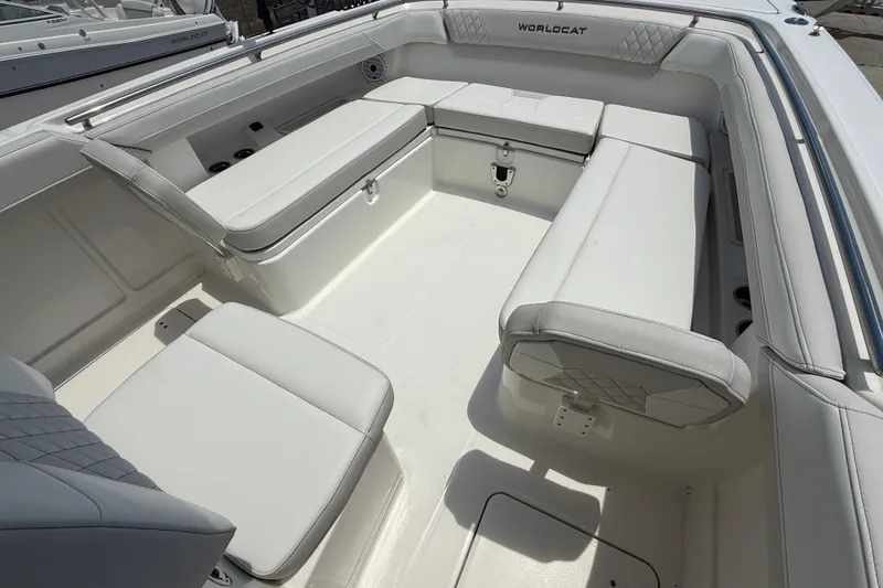 Slide: The Image of 2024 World Cat 280 CC-X boat interior with spacious white seating and modern design. - 5