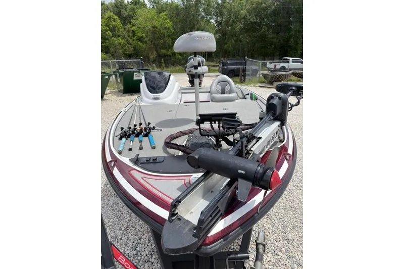 Slide: The Image of 2021 Nitro Z17 fishing boat with equipment on deck, parked outdoors. - 5