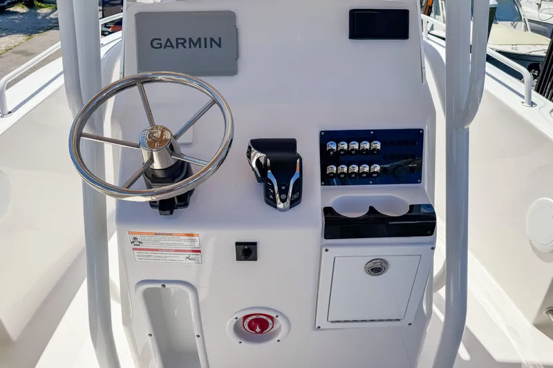 Slide: The Image of Edgewater 208CC 2025 helm with Garmin system. - 2