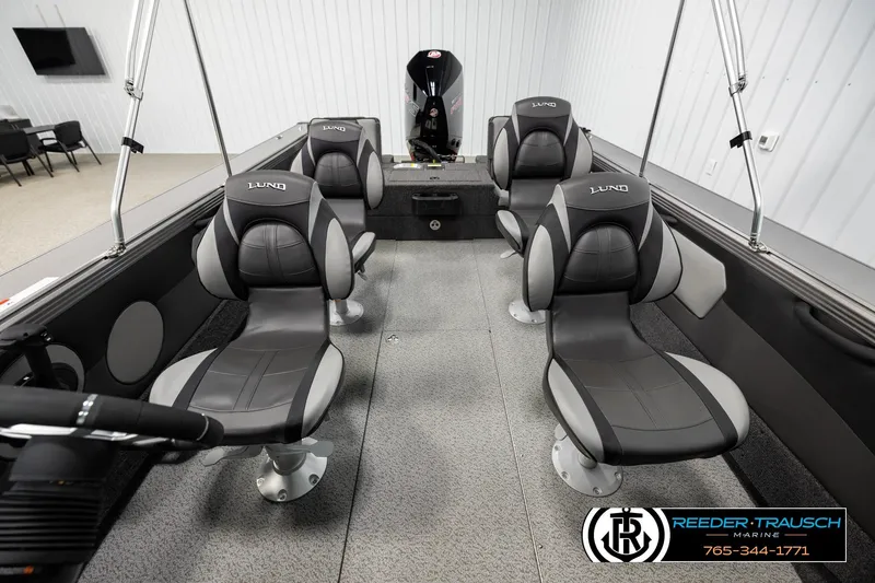 Slide: The Image of Interior of 2026 Lund 1975 Tyee boat with four cushioned seats. - 16