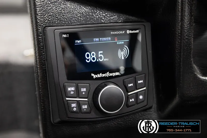 Slide: The Image of Rockford Fosgate PMX-2 stereo in 2026 Lund 1975 Tyee, displaying FM 98.5 MHz. - 34
