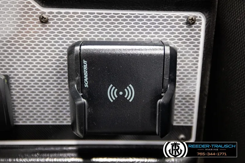 Slide: The Image of Scanstrut wireless charging mount on 2026 Lund 1975 Tyee boat dashboard. - 37
