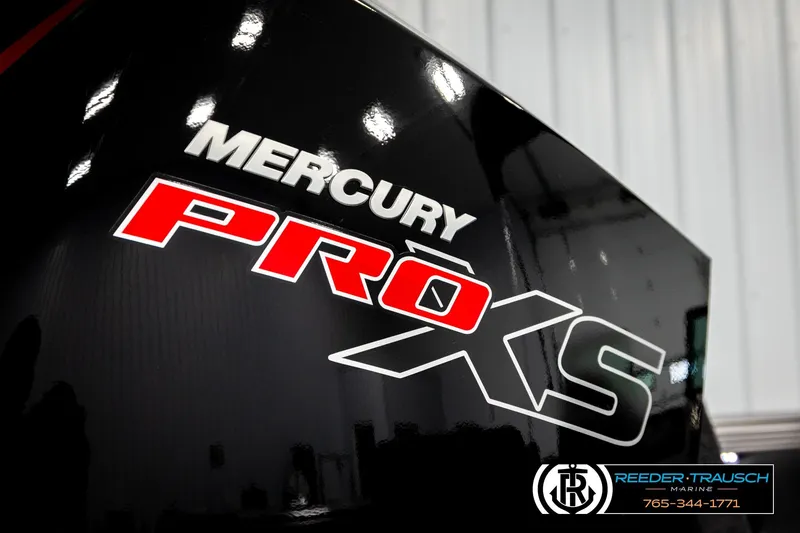 Slide: The Image of Mercury Pro XS logo on a 2026 Lund 1975 Tyee boat. - 47