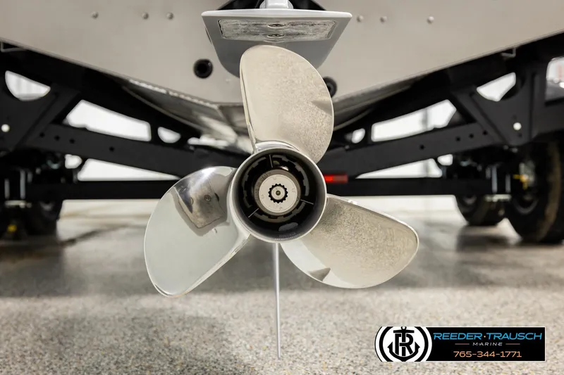 Slide: The Image of Close-up of a 2026 Lund 1975 Tyee boat propeller on a trailer. - 49