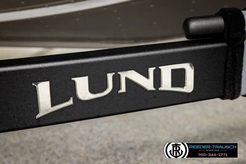 Slide: The Image of Close-up of Lund logo on 2026 Lund 1975 Tyee boat trailer. - 53