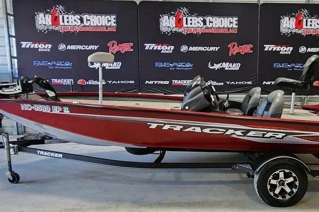 The Image of 2025 Tracker Pro Team 190 TX Tournament Edition boat displayed indoors. - 0