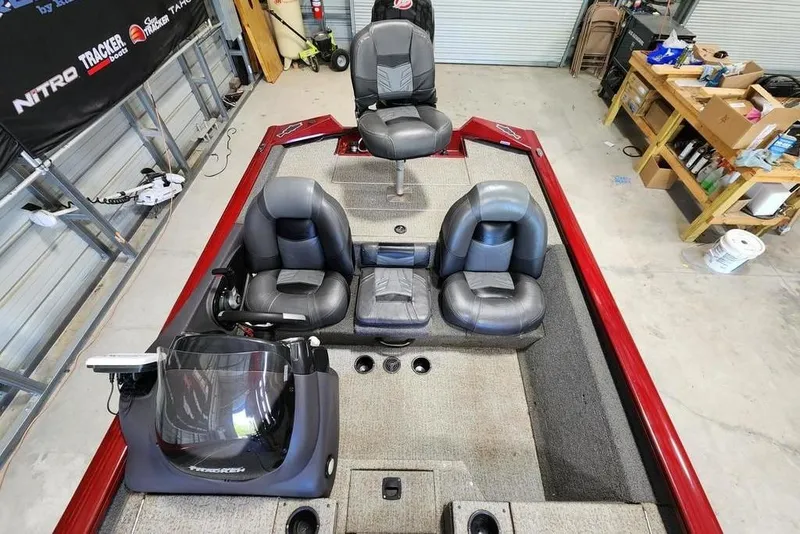 Slide: The Image of 2025 Tracker Pro Team 190 TX Tournament Edition boat interior with seating and controls. - 7