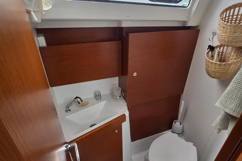 Slide: The Image of Bathroom interior of 2018 Beneteau Oceanis 38.1 yacht with sink and toilet. - 33