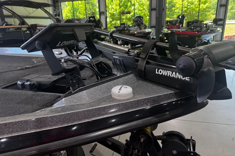 Slide: The Image of 2020 Ranger Z185 boat with Lowrance electronics and trolling motor in a showroom. - 8