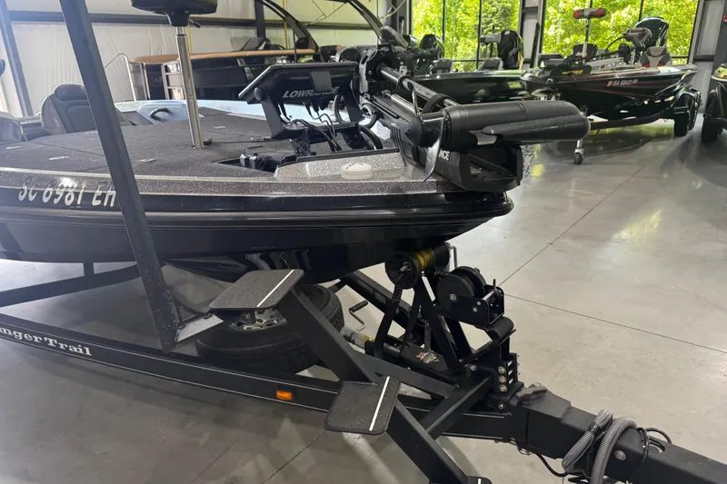 Slide: The Image of 2020 Ranger Z185 boat on trailer in showroom, featuring Lowrance electronics. - 9