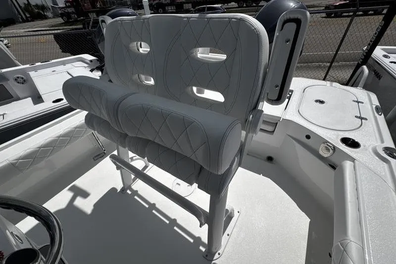 Slide: The Image of 2026 Blazer Bay 2440 boat interior with cushioned seating and modern design. - 24