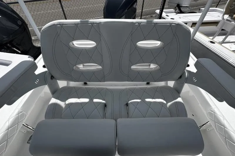Slide: The Image of 2026 Blazer Bay 2440 boat with stylish gray seating and diamond stitching. - 25