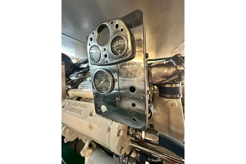 Slide: The Image of Engine control panel of a 1980 Bertram 58 Convertible yacht. - 92