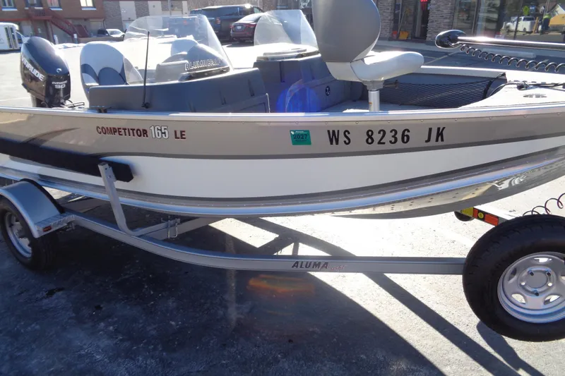 Slide: The Image of 2015 Alumacraft Competitor 165 CS boat on trailer, side view. - 4