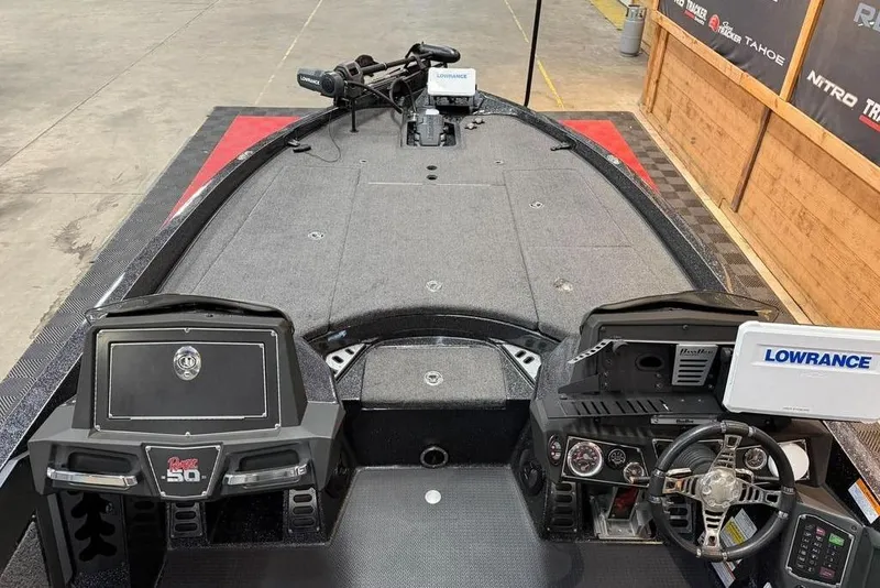 Slide: The Image of 2021 Ranger Z520L boat interior with Lowrance electronics and dual consoles. - 10