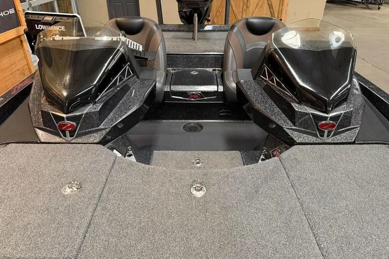 Slide: The Image of 2021 Ranger Z520L boat interior with dual consoles and seating. - 4