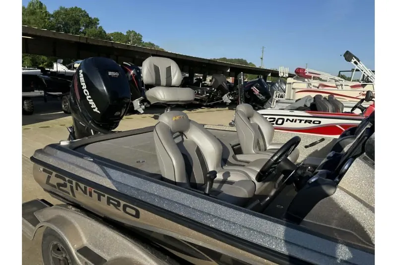 Slide: The Image of 2018 Nitro Z21 Pro boat with Mercury engine, parked outdoors. - 10