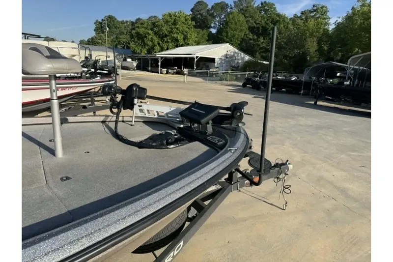 Slide: The Image of 2018 Nitro Z21 Pro boat on trailer, featuring advanced fishing equipment and spacious deck. - 8