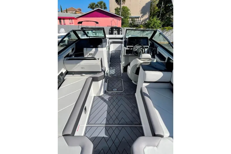 Slide: The Image of 2022 Cobalt R8 Outboard boat interior with modern seating and sleek design. - 11