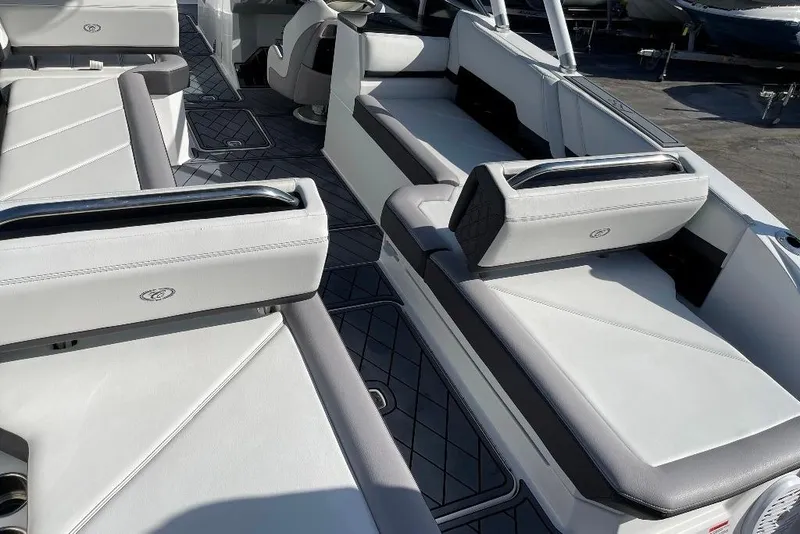 Slide: The Image of 2022 Cobalt R8 Outboard boat interior with luxurious seating and modern design. - 13