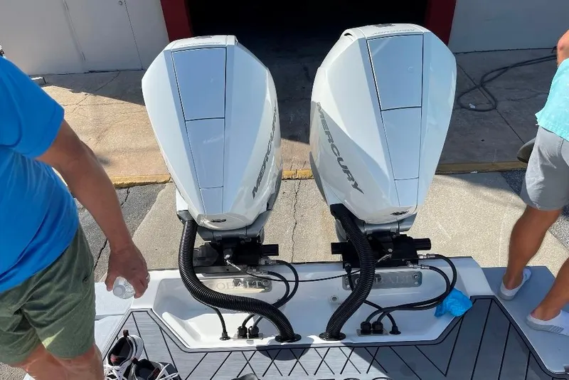 Slide: The Image of 2022 Cobalt R8 Outboard with dual Mercury engines on a sunny day. - 7