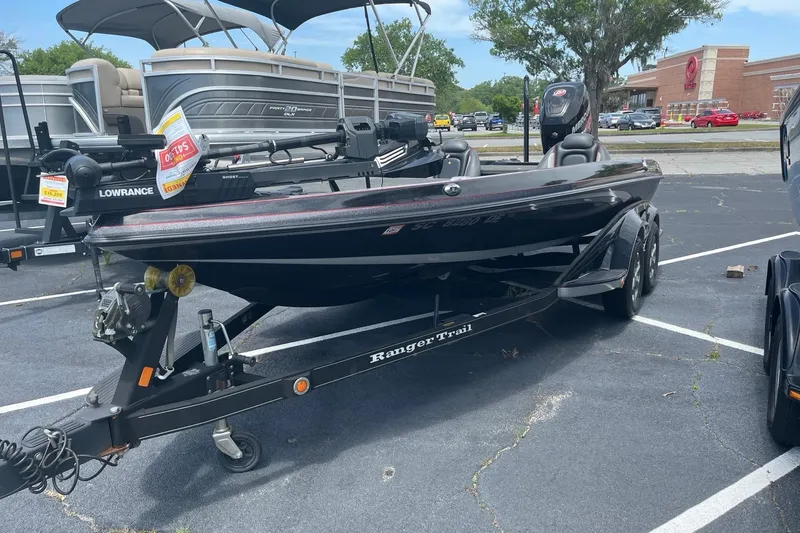 The Image of 2017 Ranger Z518 Cup-Equipped boat on trailer in parking lot. - 1