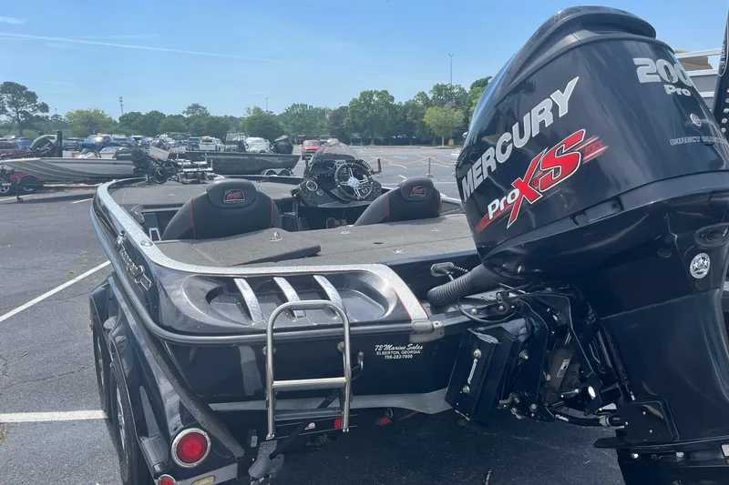 Slide: The Image of 2017 Ranger Z518 Cup-Equipped boat with Mercury Pro XS engine in parking lot. - 5