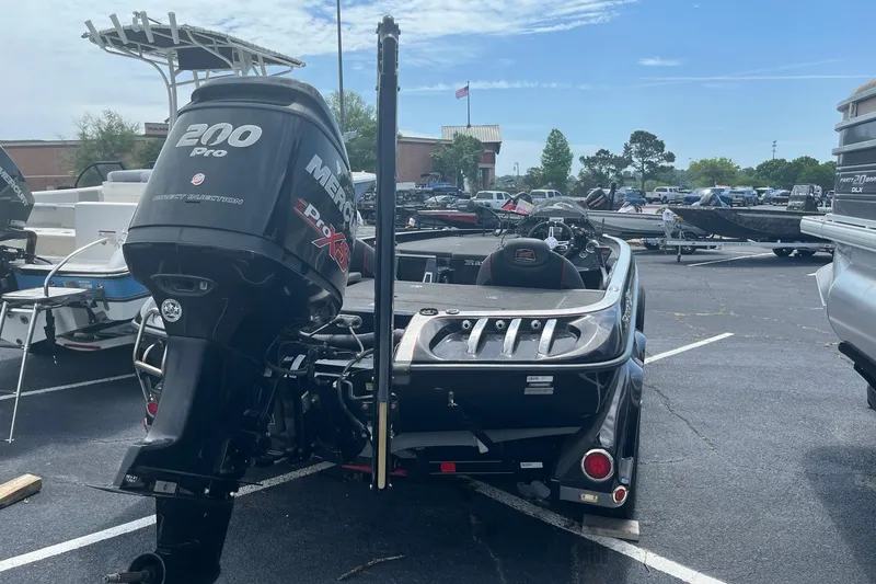 Slide: The Image of 2017 Ranger Z518 Cup-Equipped boat with Mercury 200 Pro XS engine in parking lot. - 6