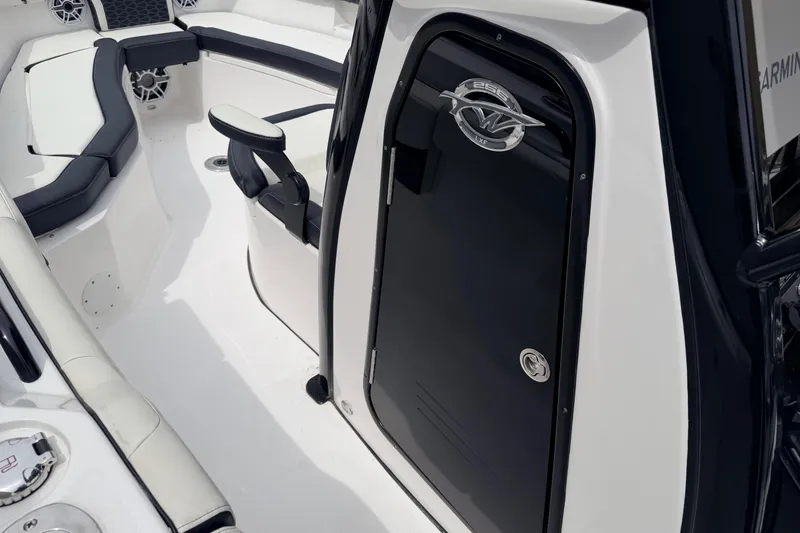 Slide: The Image of 2024 Tidewater 256 LXF boat interior with sleek seating and modern design. - 28