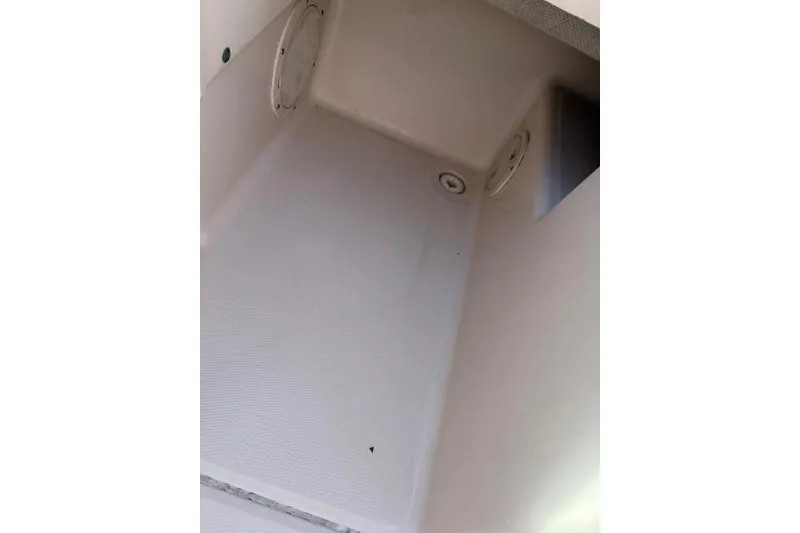 Slide: The Image of Interior view of a 1994 Grady-White Explorer 244 boat compartment. - 11