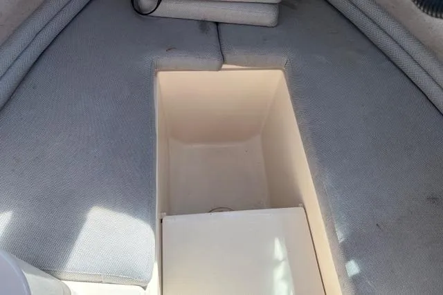 Slide: The Image of Interior storage compartment of 1994 Grady-White Explorer 244 boat. - 12