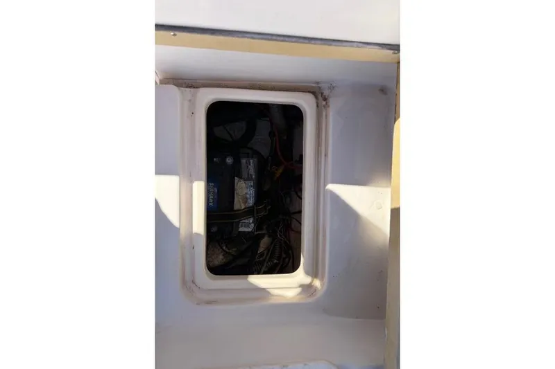 Slide: The Image of Battery compartment of a 1994 Grady-White Explorer 244 boat. - 16