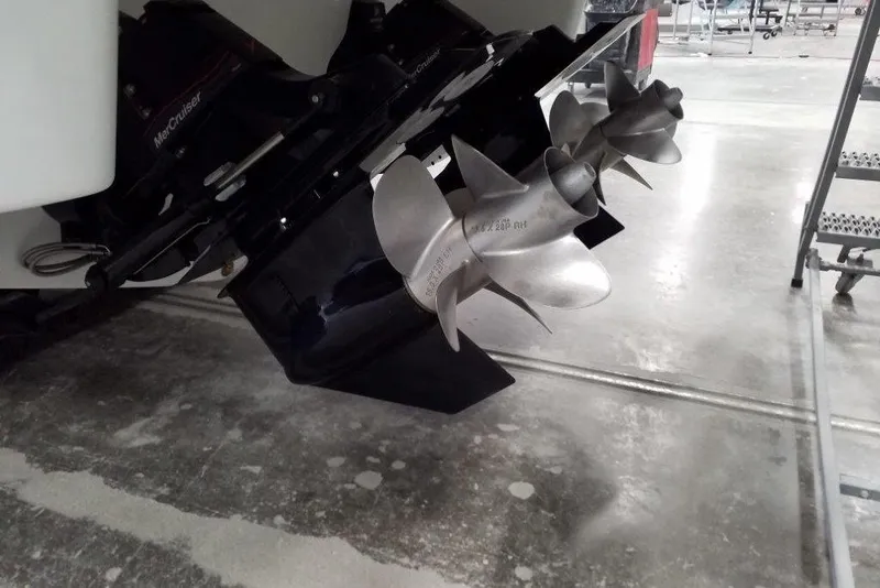 Slide: The Image of 2019 Formula 310 Bowrider boat propellers in a workshop setting. - 13