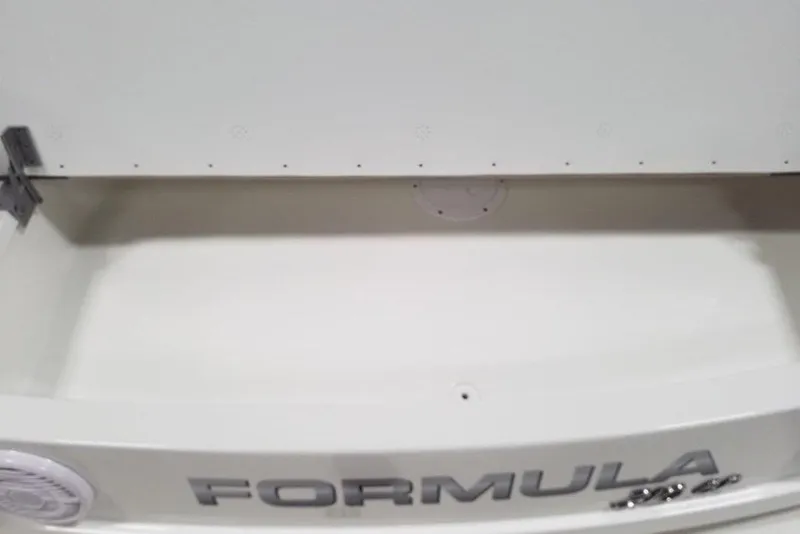 Slide: The Image of Rear view of a 2019 Formula 310 Bowrider boat, showcasing the brand logo. - 14
