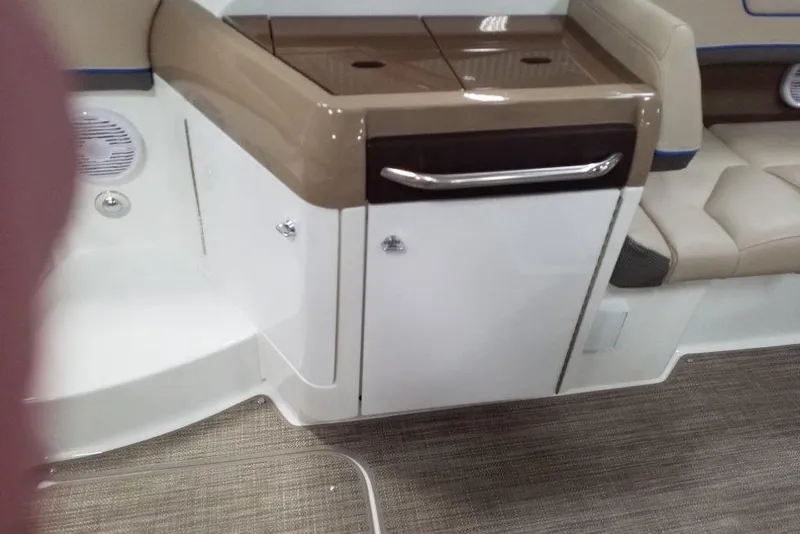 Slide: The Image of Interior of a 2019 Formula 310 Bowrider boat, featuring seating and storage compartments. - 20
