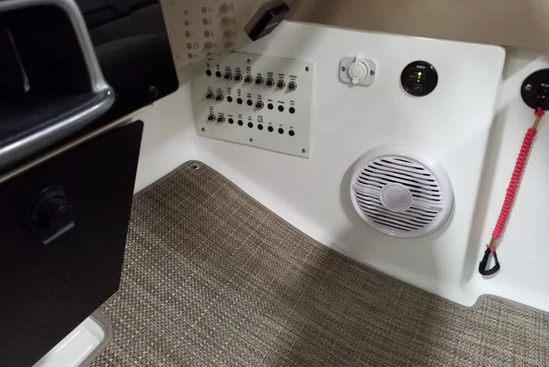 Slide: The Image of Control panel and speaker in 2019 Formula 310 Bowrider boat interior. - 27