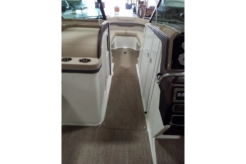 Slide: The Image of Interior view of 2019 Formula 310 Bowrider boat, featuring seating and dashboard. - 30