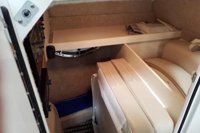 Slide: The Image of 2019 Formula 310 Bowrider cabin interior with seating and storage. - 34