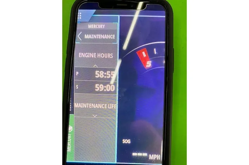 Slide: The Image of Smartphone displaying engine maintenance data for 2019 Formula 310 Bowrider. - 39