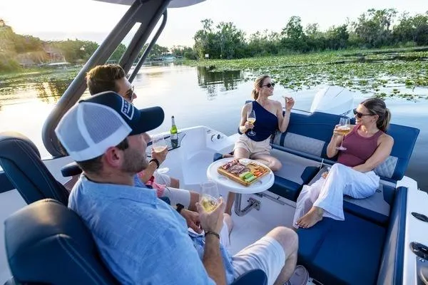 Slide: The Image of People enjoying a relaxing outing on a 2026 Monterey Elite 25 OB boat. - 9