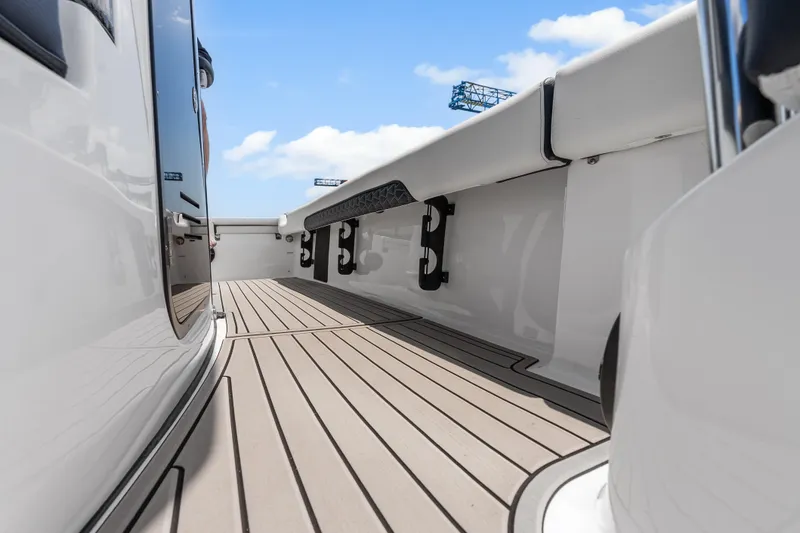 Slide: The Image of 2026 Tidewater 2500 Carolina Bay boat deck with sleek design and modern features. - 28