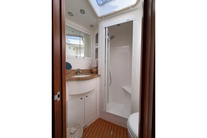 Slide: The Image of Luxurious bathroom in 2016 Nordhavn 52 yacht with shower and vanity. - 16