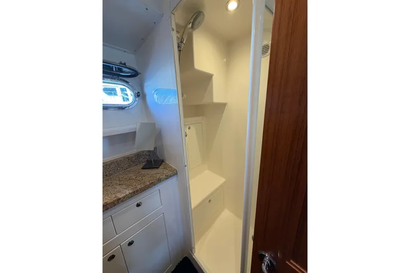 Slide: The Image of Bathroom interior of 2016 Nordhavn 52 yacht with shower and granite countertop. - 20